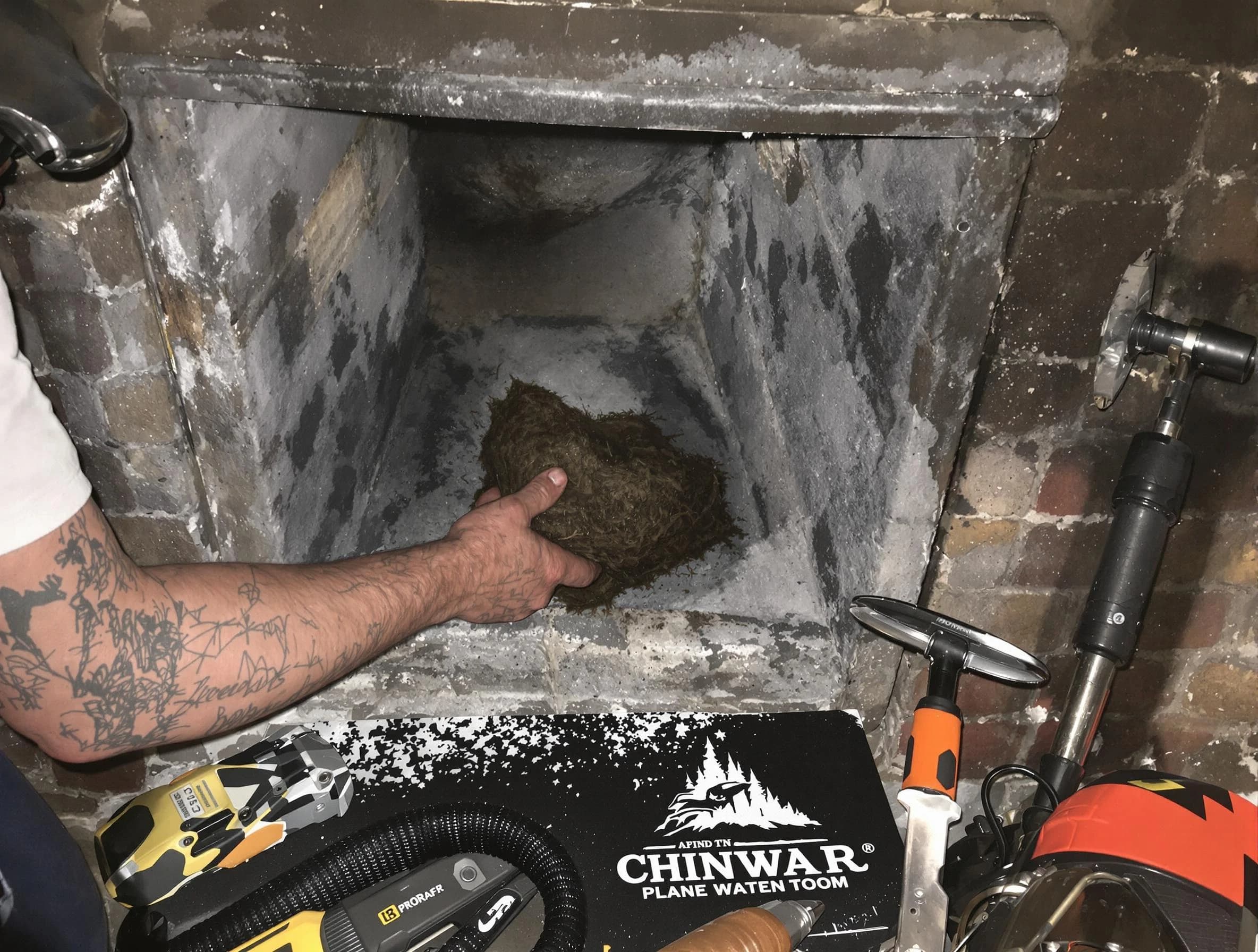 Chickasha Chimney Sweep safely removing debris and screening chimney in Chickasha, OK